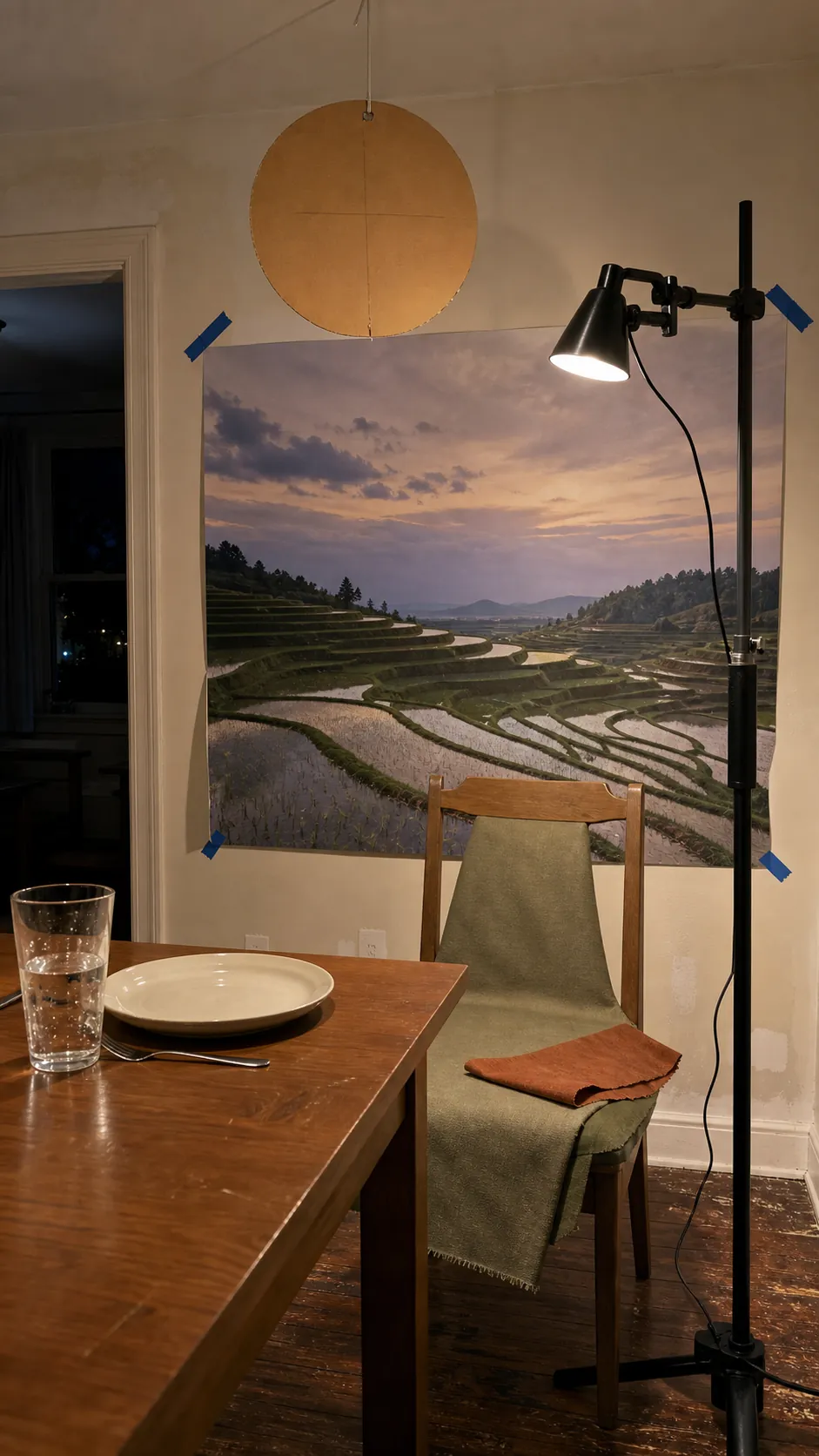 Dining chair and portable lighting tested against a scenic mural sample