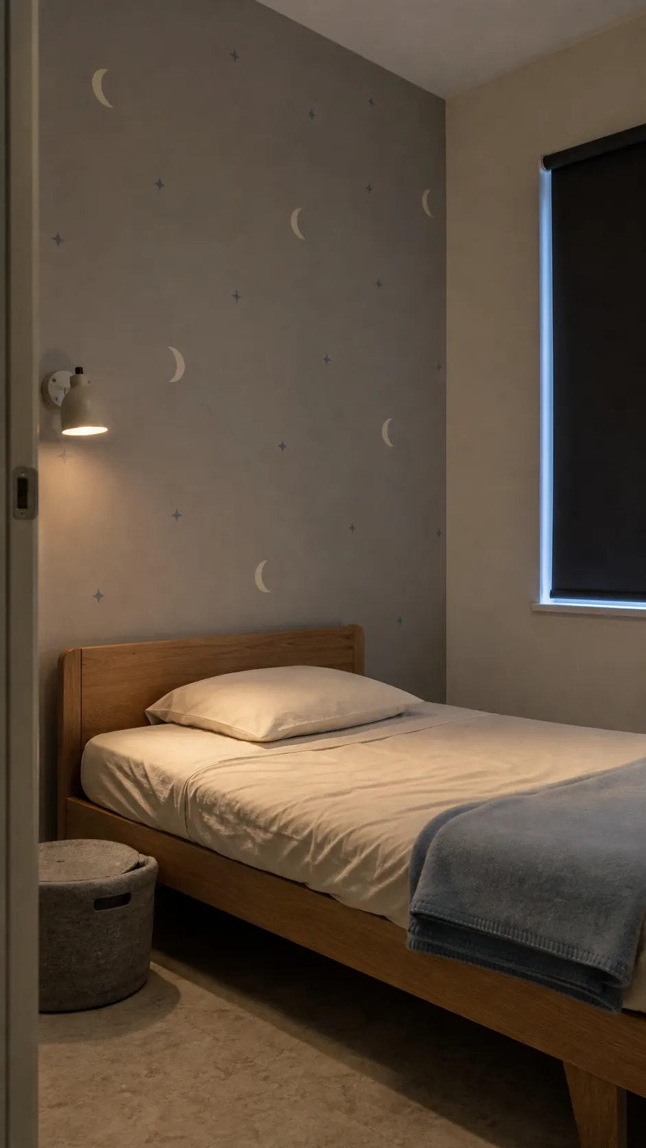 Restful toddler sleep space with quiet moon and star wallpaper